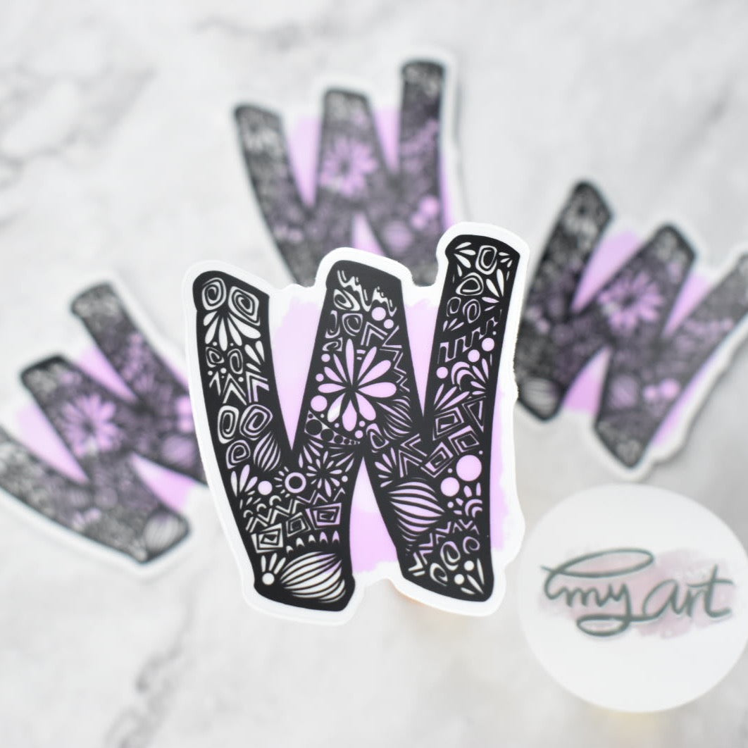 Letter “W” Clear sticker colored background