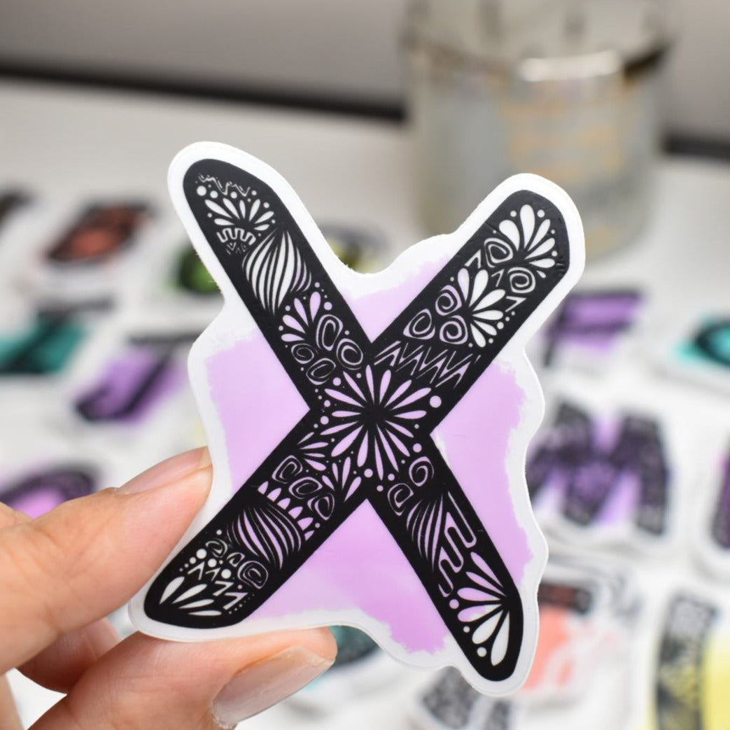 Letter “X” Clear sticker colored background