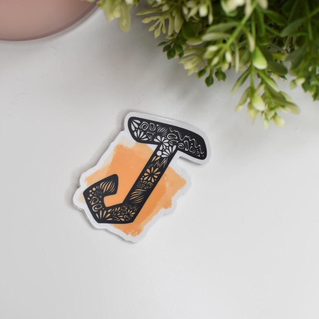 Letter “J” Clear sticker colored Background