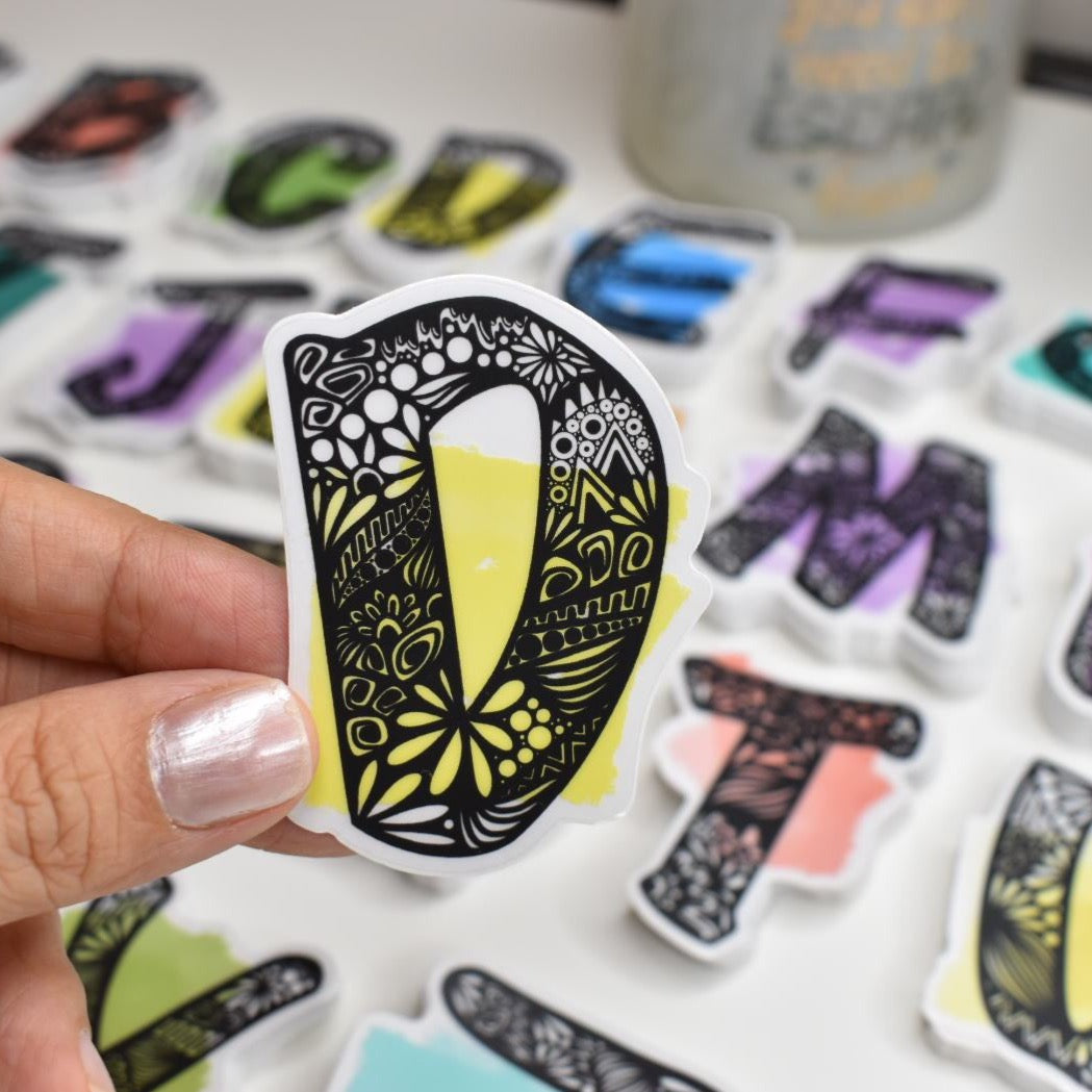 Letter “D” Clear sticker colored Background