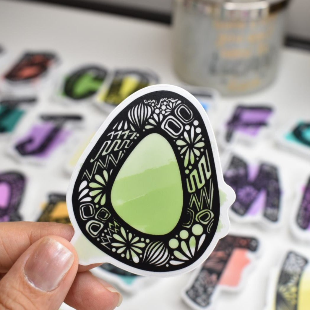 Letter “O” Clear sticker colored Background