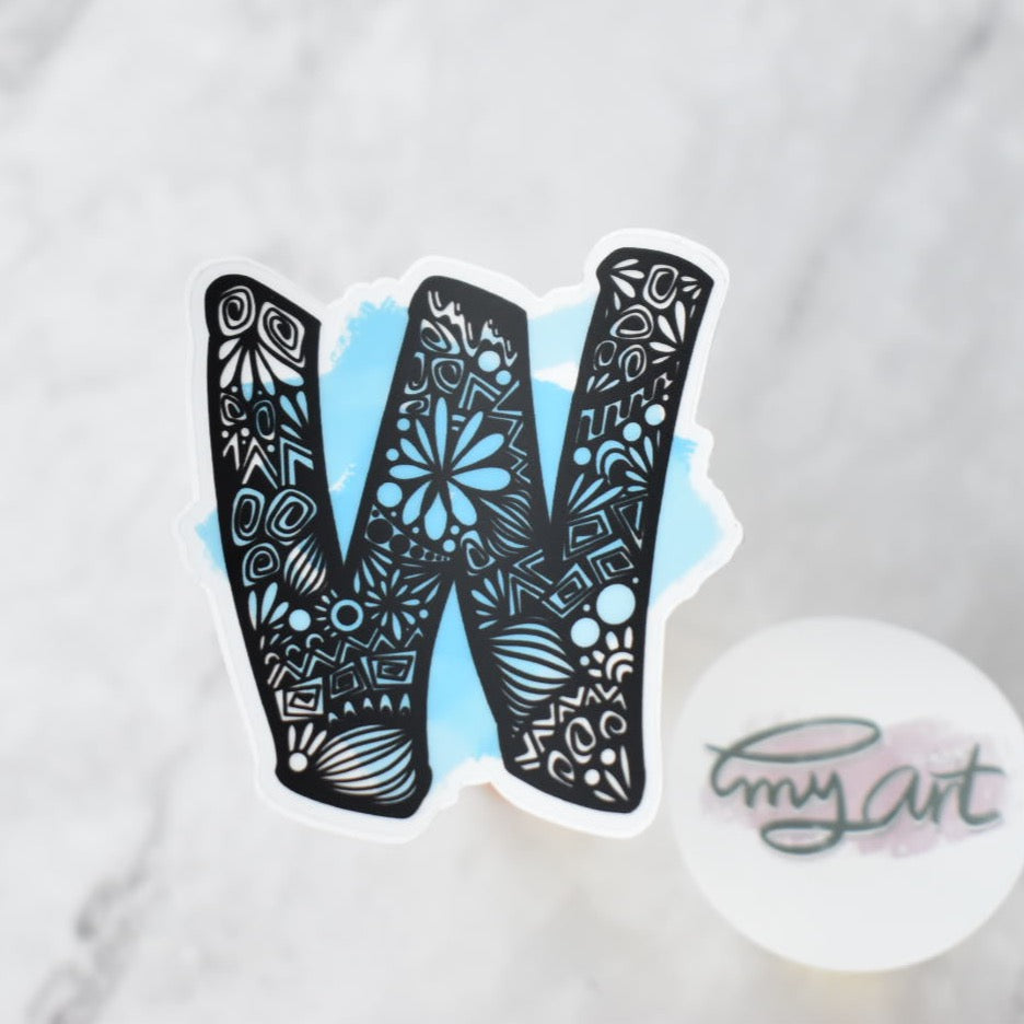 Letter “W” Clear sticker colored background
