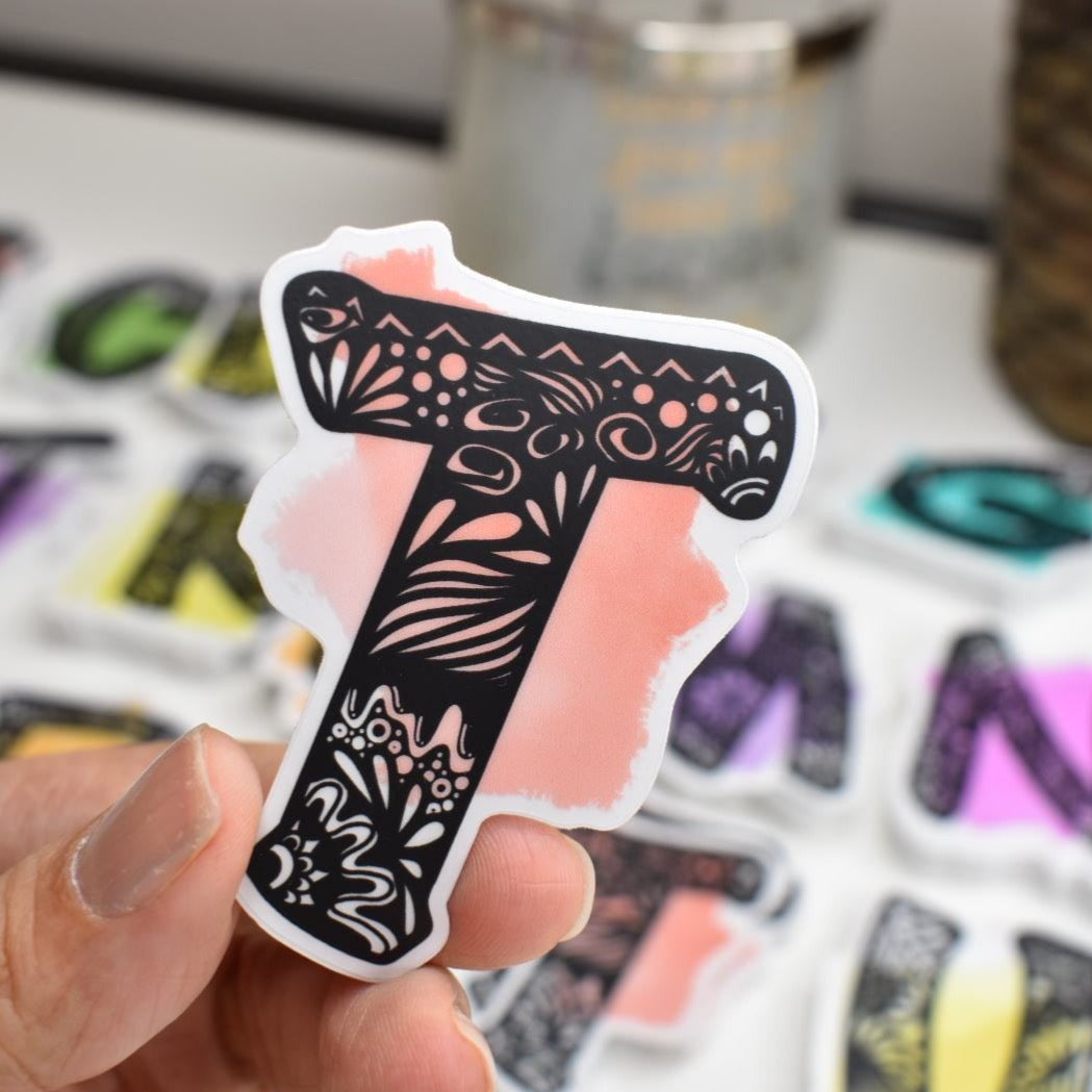 Letter “T” Clear sticker colored Background
