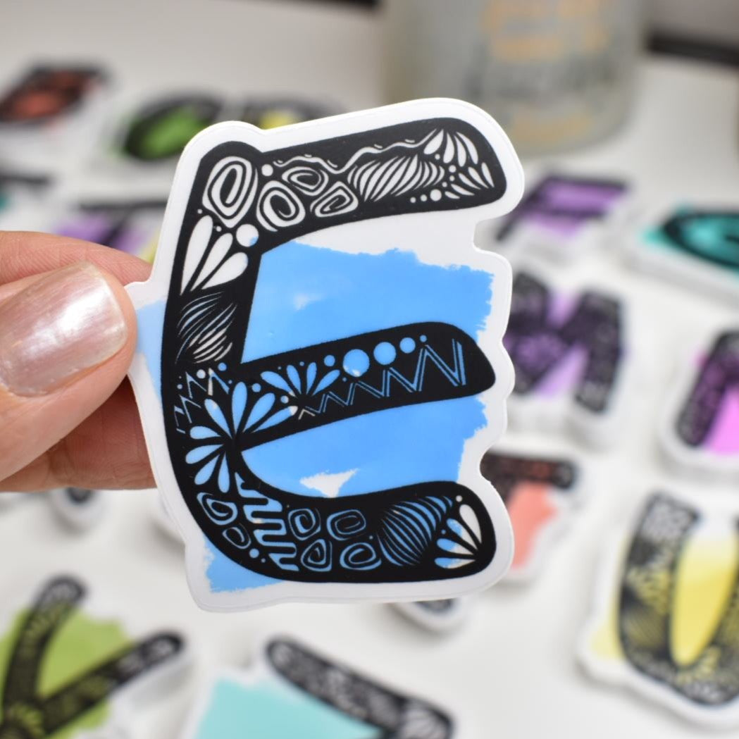 Letter “E” Clear sticker colored Background