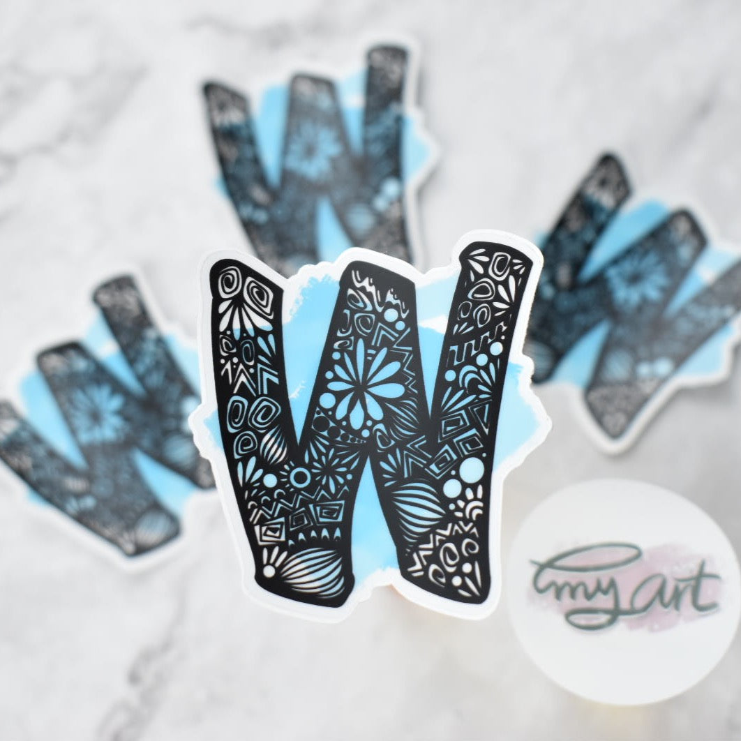 Letter “W” Clear sticker colored background