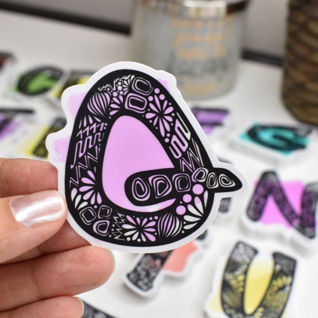 Letter “Q” Clear sticker colored Background