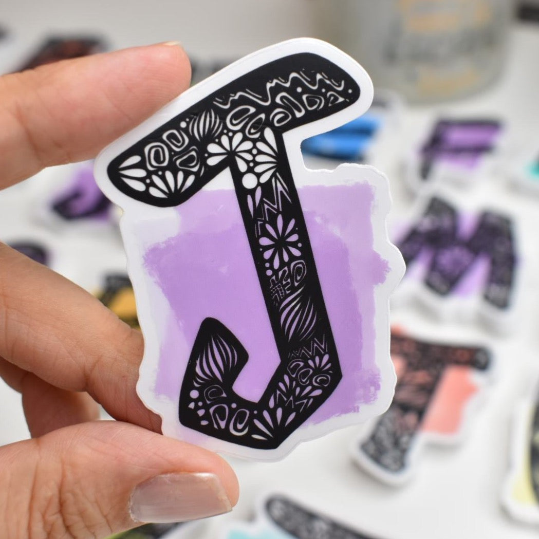 Letter “J” Clear sticker colored Background