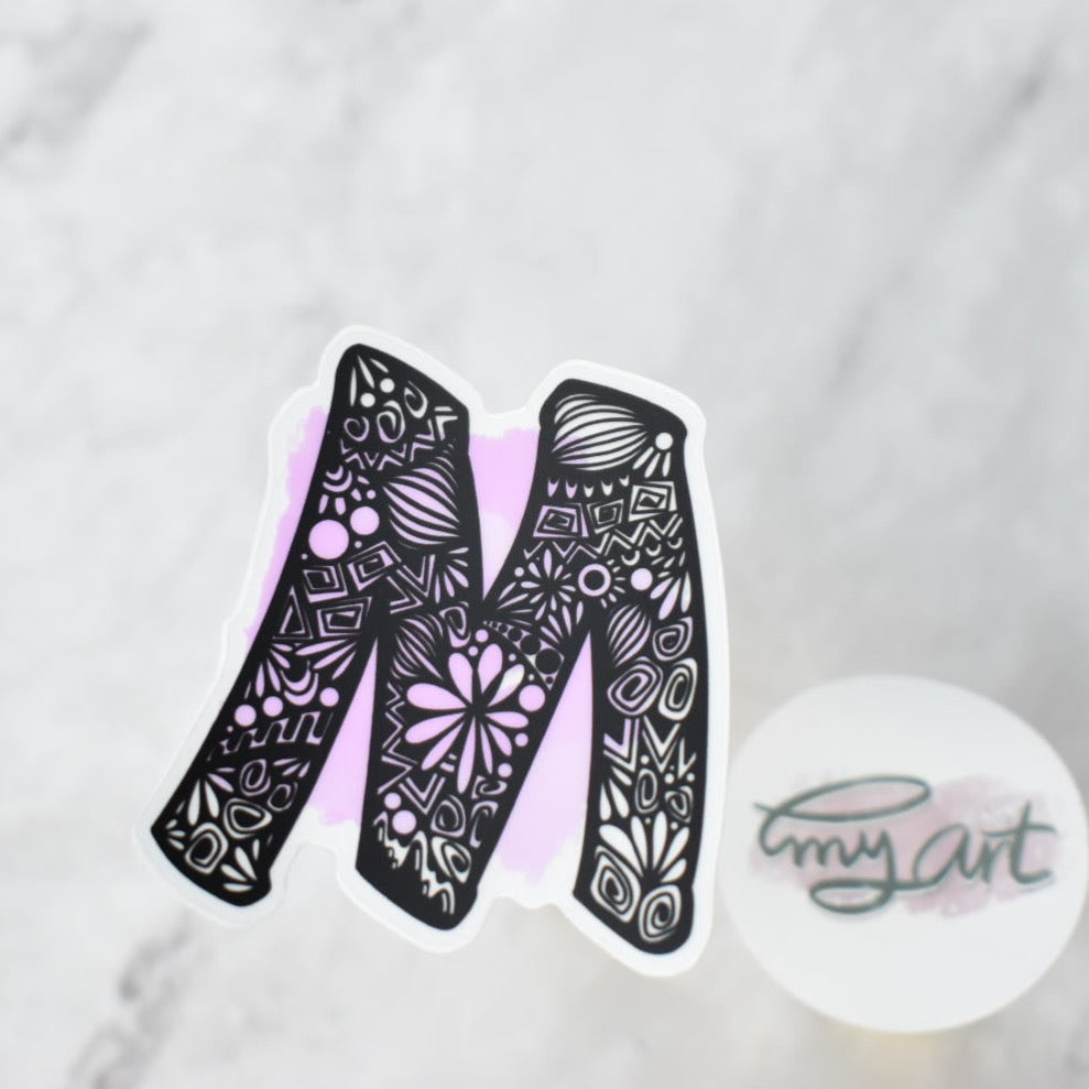 Letter “M”  Clear sticker colored Background